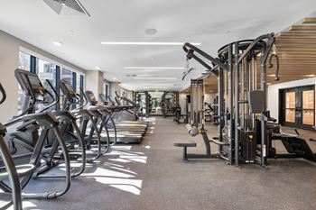 a row of exercise equipment in a gym at Stonehill at West Orange, New Jersey, 07052